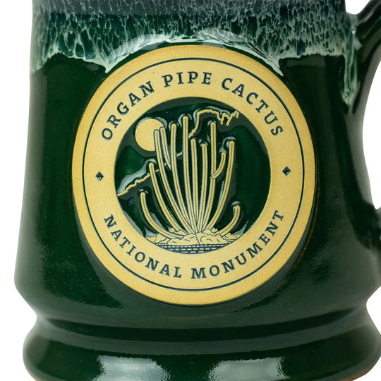 Green mug with Organ Pipe Cactus National Monument logo