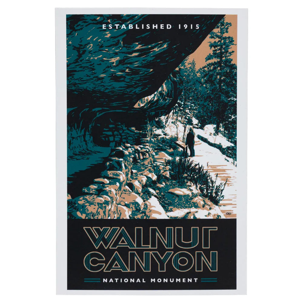 Postcard of Walnut Canyon National Monument with a person hiking through a canyon.