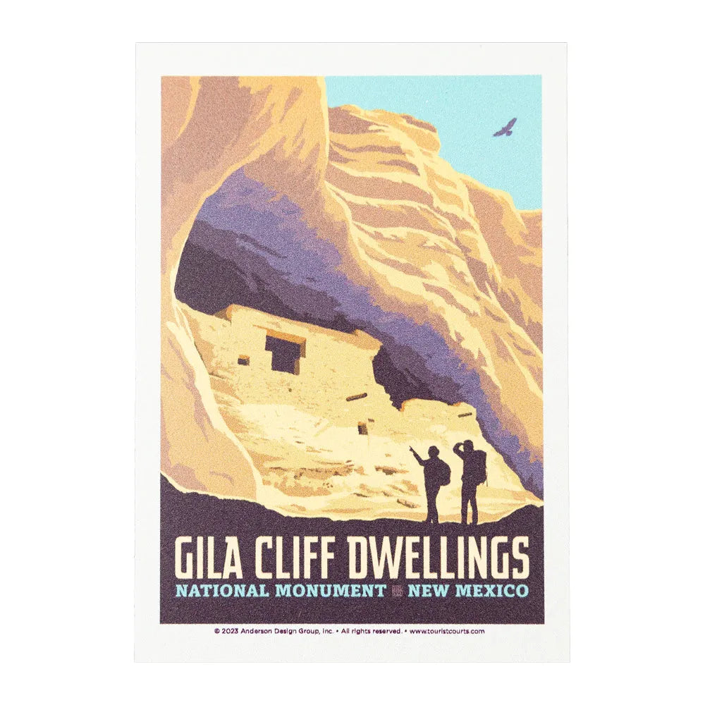 Image of Gila Cliff Dwellings National Monument in New Mexico with a scenic cliff and two figures.