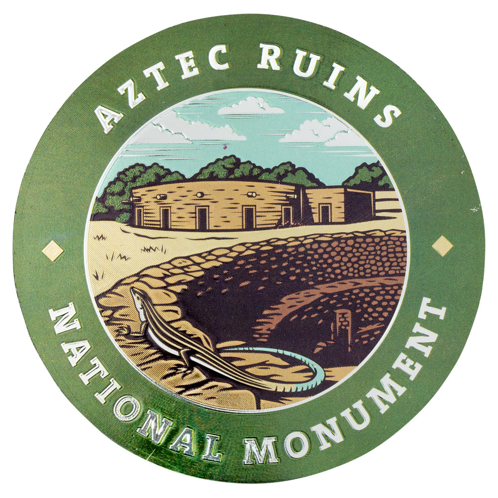 Logo of Aztec Ruins National Monument with circular design and illustration of ruins.
