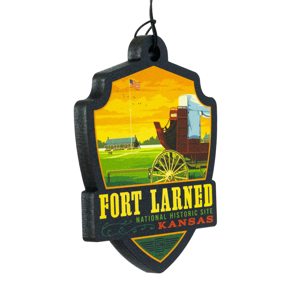 Decorative ornament for Fort Larned National Historic Site in Kansas with wagon and American flag illustration.