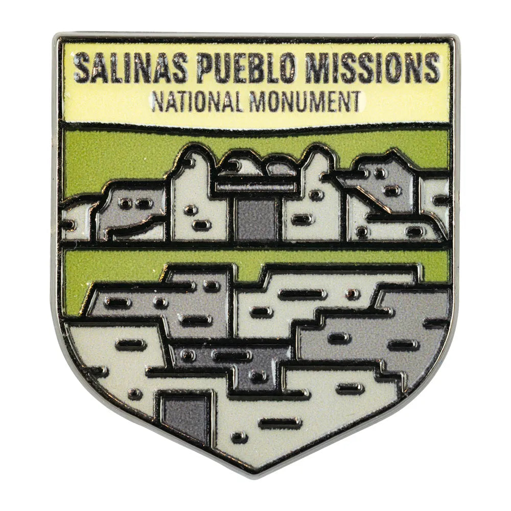 Badge of Salinas Pueblo Missions National Monument with architectural design and text on a white background
