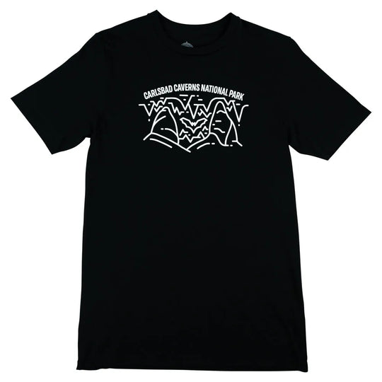 Carlsbad Caverns National Park logo with cave and bat design on a black t-shirt against a white background