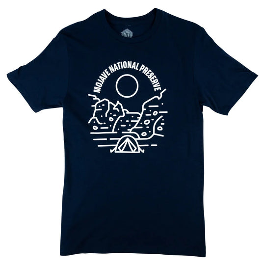Navy blue t-shirt with white line art design of mountains, cactus, and tent, featuring 'Mojave National Preserve' text on a white background.