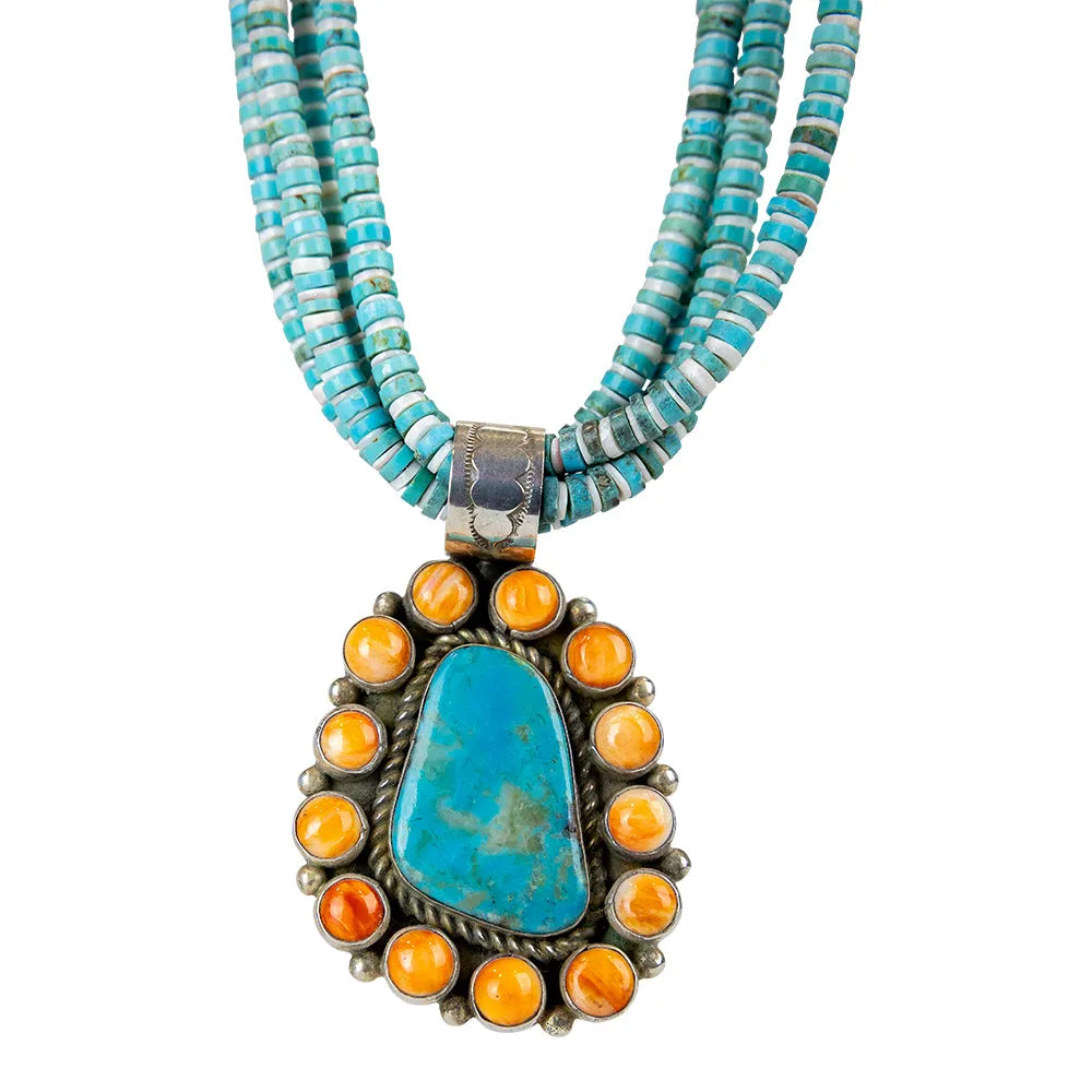 Turquoise and spiny oyster stone pendant with silver clasp attached to multi-stranded bead necklace on a white background