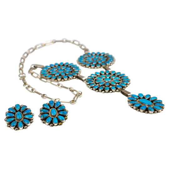 Turquoise floral jewelry set with necklace and earrings on a white background