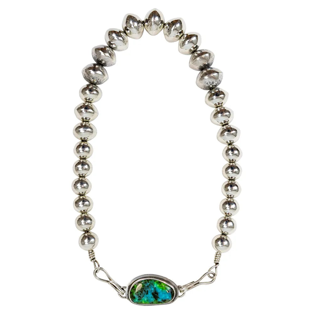 Silver beaded choker necklace with a green and blue stone clasp on a white background