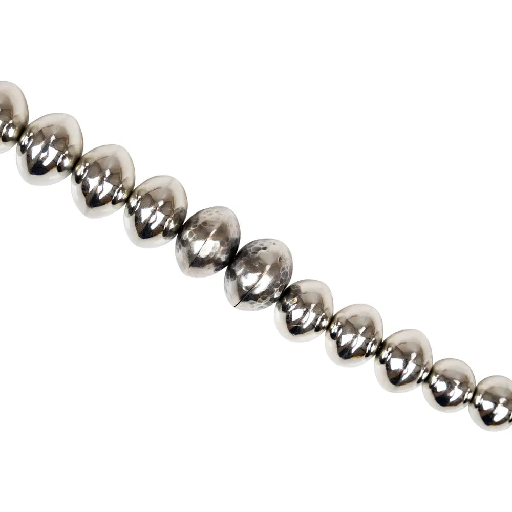 Silver beaded choker necklace with a green and blue stone clasp on a white background