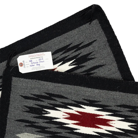 Vallero Star Navajo Rug by Stella Paul showing certificate of authenticity