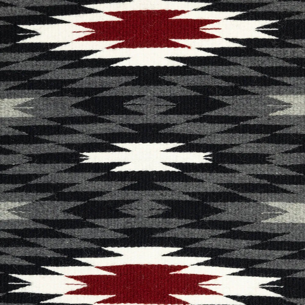 Detail of center section of Vallero Star Navajo Rug by Stella Paul