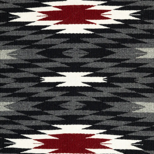Detail of center section of Vallero Star Navajo Rug by Stella Paul