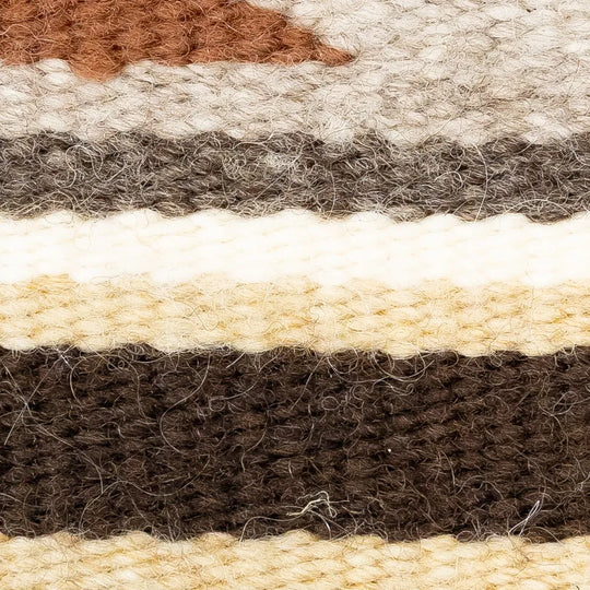 Close-up of a woven fabric with brown, beige, and gray stripes.