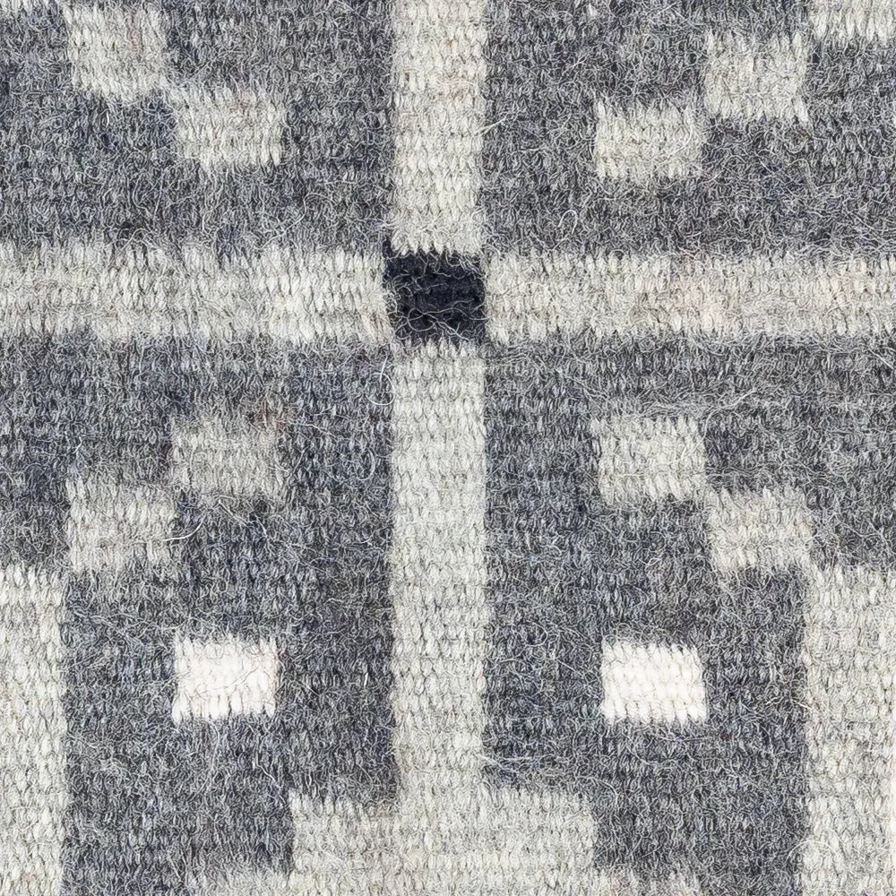 Close-up of a textured gray and white patterned fabric