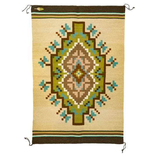 Handwoven Burntwater rug by Judy Nelson. Natural wool and plant-dyed hues create the Butterfly Rug, rich in Navajo tradition and artistry.
