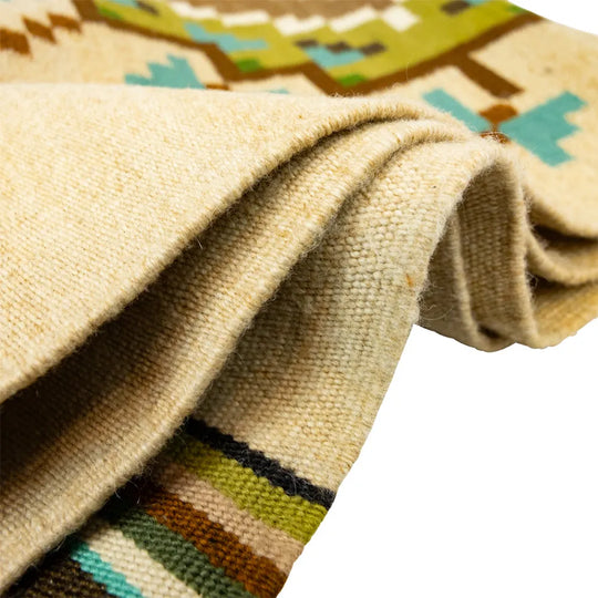 Handwoven Burntwater rug by Judy Nelson. Natural wool and plant-dyed hues create the Butterfly Rug, rich in Navajo tradition and artistry.