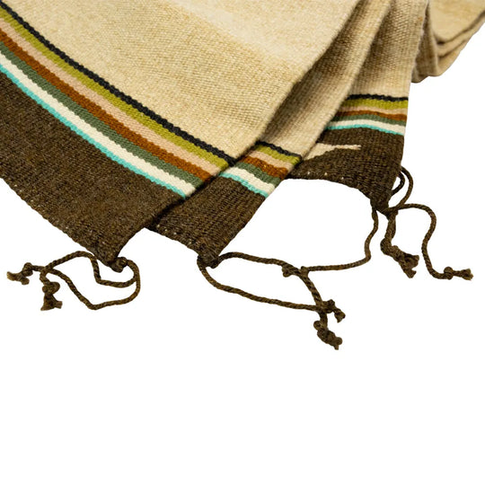 Handwoven Burntwater rug by Judy Nelson. Natural wool and plant-dyed hues create the Butterfly Rug, rich in Navajo tradition and artistry.