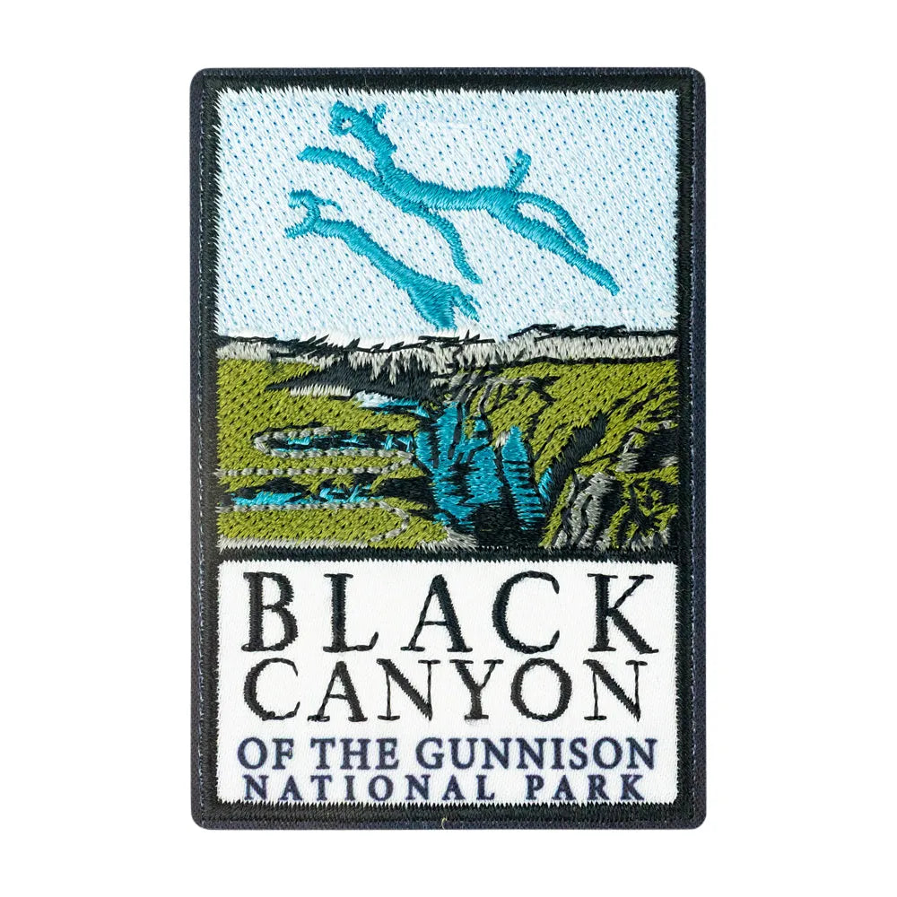 An embroidered rectangular patch featuring a scenic Black Canyon of the Gunnison National Park design with blue sky, green canyon walls, and large black text reading 'BLACK CANYON OF THE GUNNISON NATIONAL PARK' on a white background.