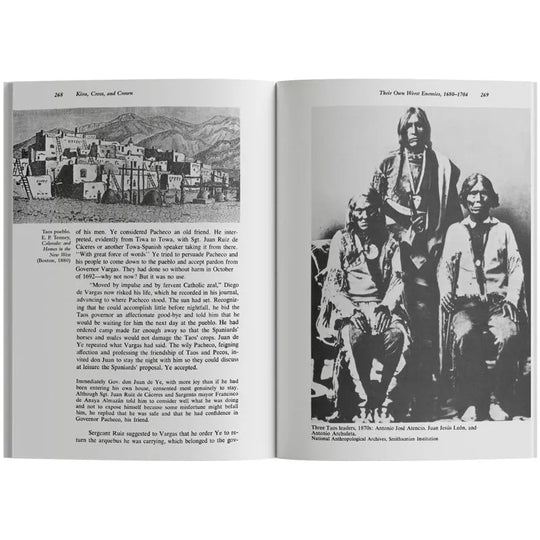 Open book with black and white photograph of three men and text on a white background
