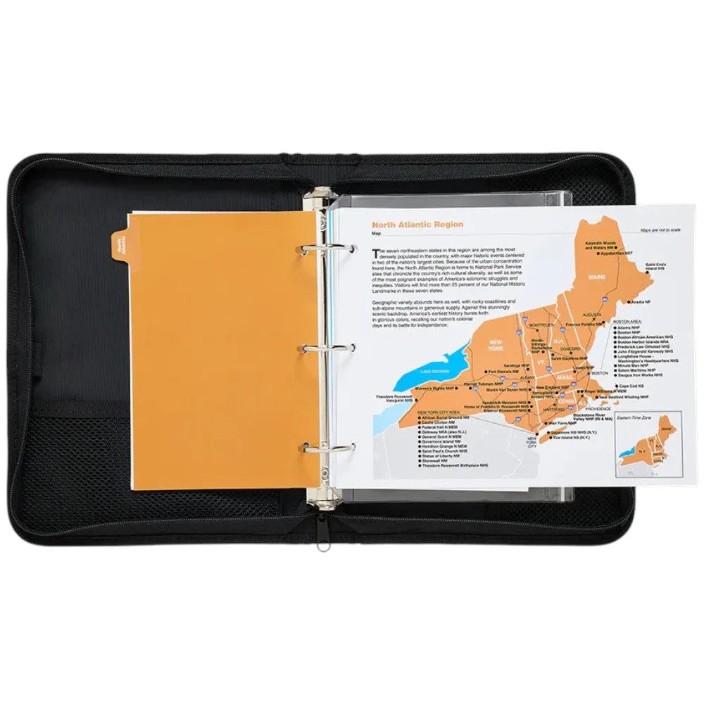 Open binder with national park map of the North Atlantic Region on a white background