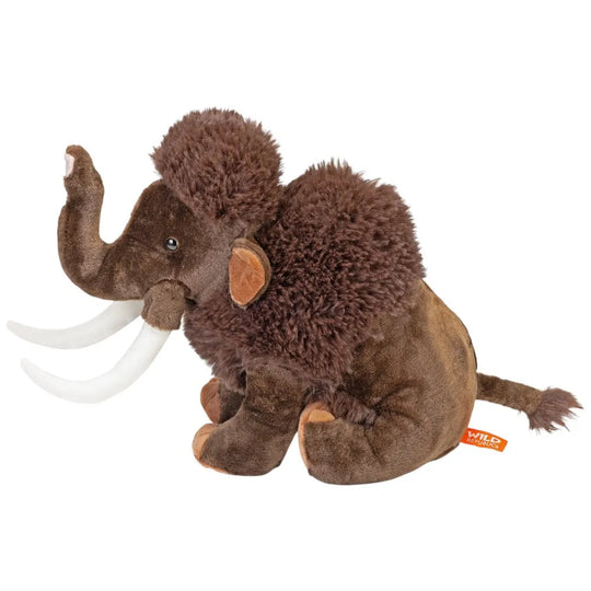 Plush toy mammoth with brown fur and white tusks on a white background