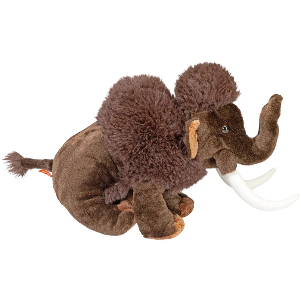 Plush toy woolly mammoth with a brown coat and white tusks on a white background