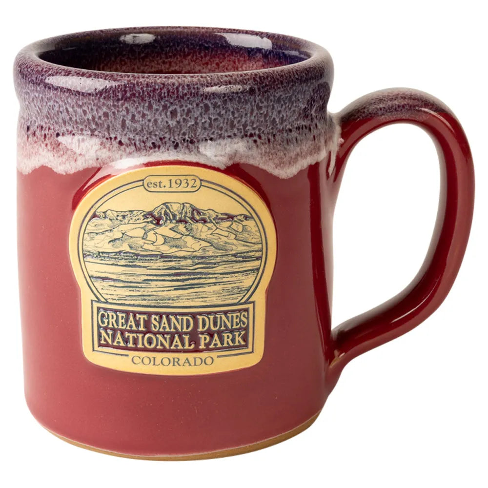 Cranberry mug with Great Sand Dunes National Park logo on a white background