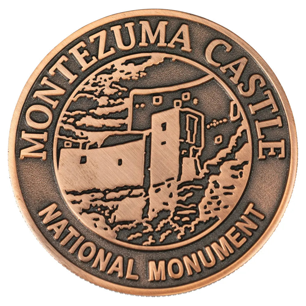 Montezuma Castle - Tuzigoot National Monument Collectible Coin showing Montezuma Castle side
