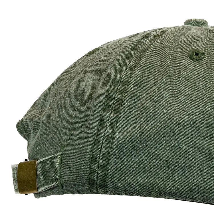 Green cotton cap side view with buckle detail