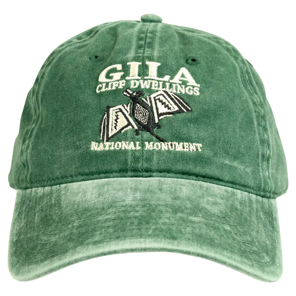 A green washed cotton baseball cap featuring embroidered text and a bat graphic on the front. The text reads &
