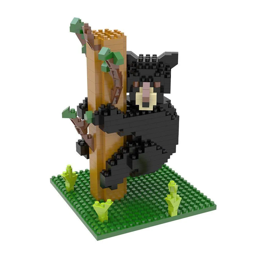 Mini block set of a black bear climbing a tree on a white background
