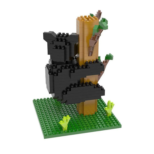Mini block set of a black bear climbing a tree on a white background