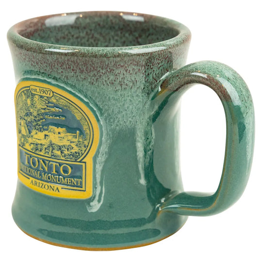 Green mug with Tonto National Monument Arizona logo on a white background