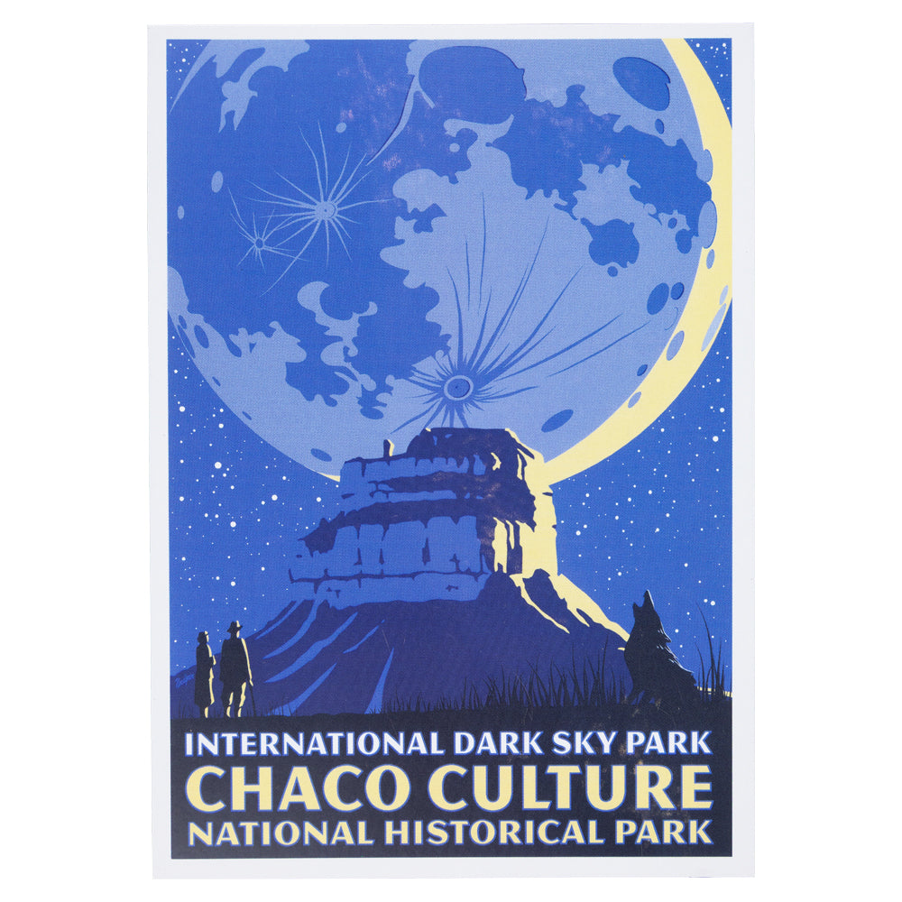 Postcard of Chaco Culture National Historical Park with a large moon and people looking up at it.