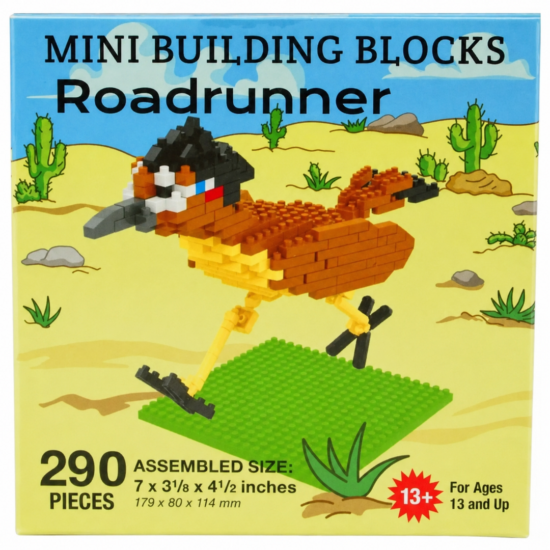 Front of a building blocks toy box labeled 'MINI BUILDING BLOCKS Roadrunner' showing an assembled roadrunner made from brown, yellow, black, white, and red blocks on a green base, with desert scenery printed on the packaging.