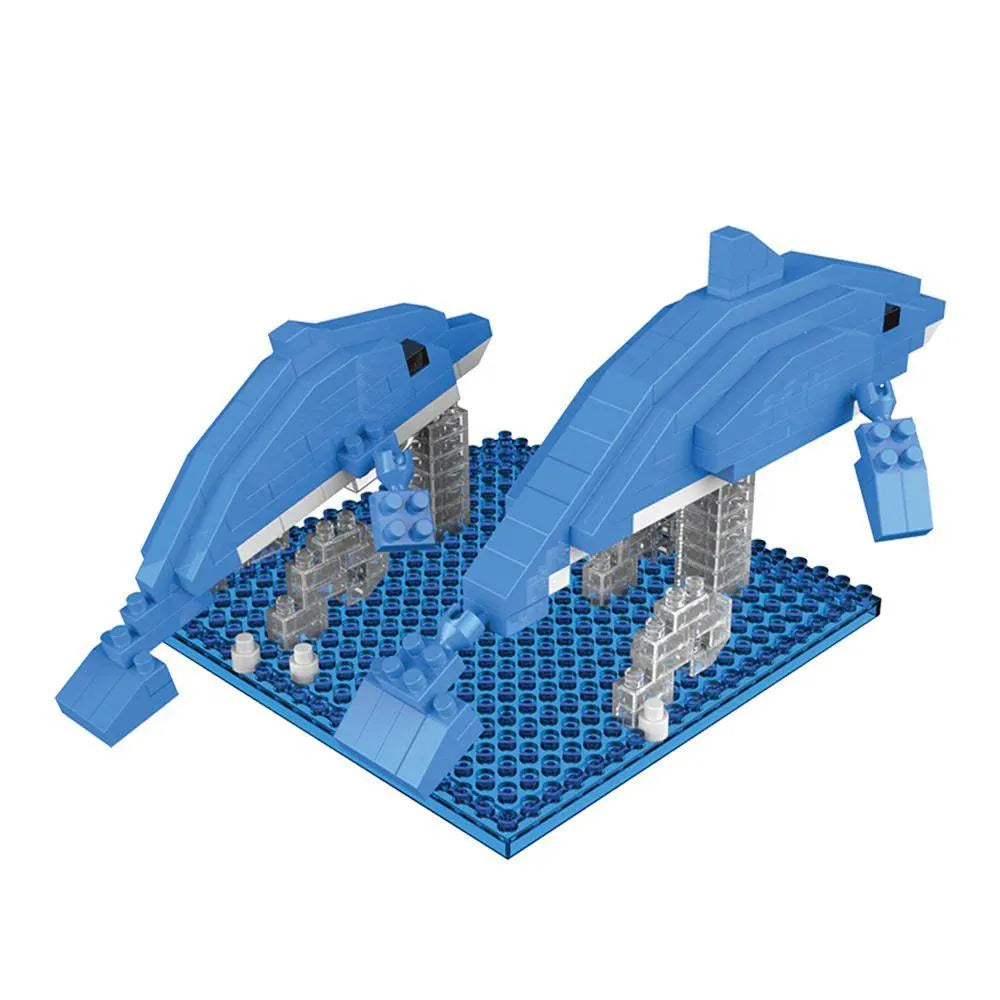 Blue mini block building set with two dolphins on a blue baseplate against a white background