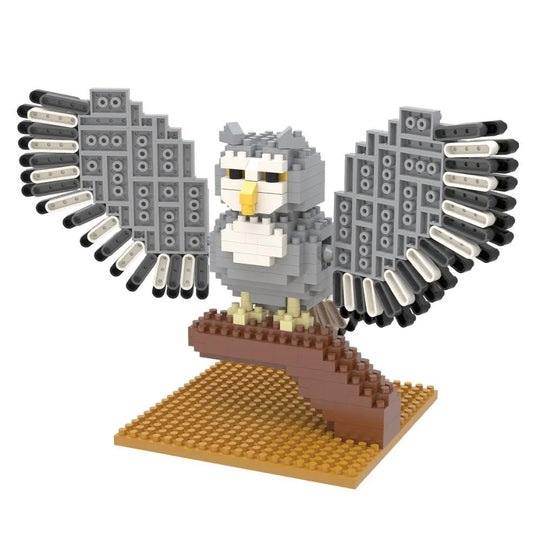 Mini block set of a great horned owl against a white background