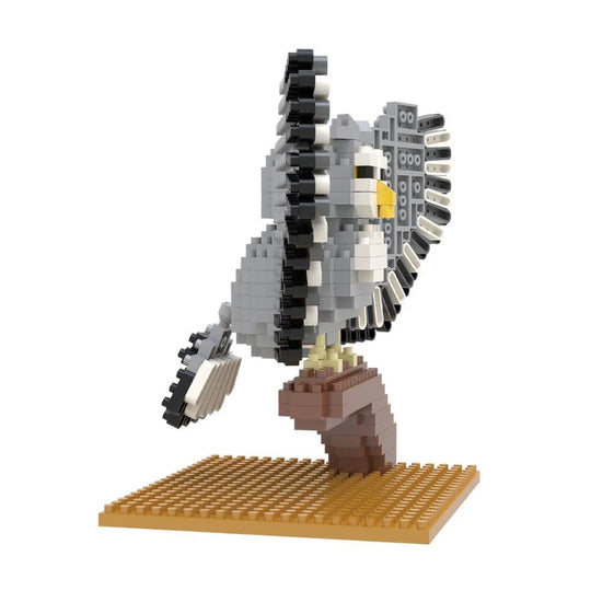 Mini block set of a great horned owl against a white background