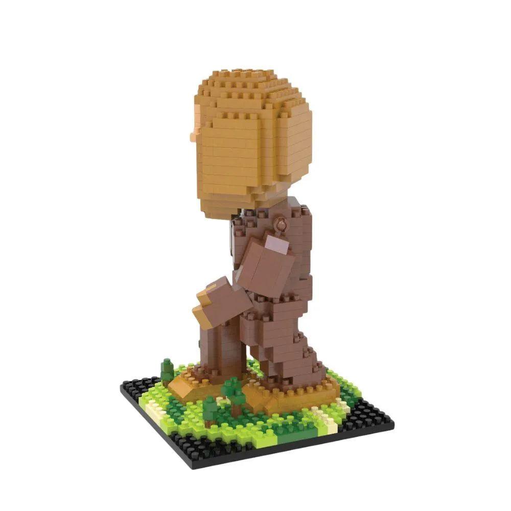 A mini block figure of Bigfoot against a white background