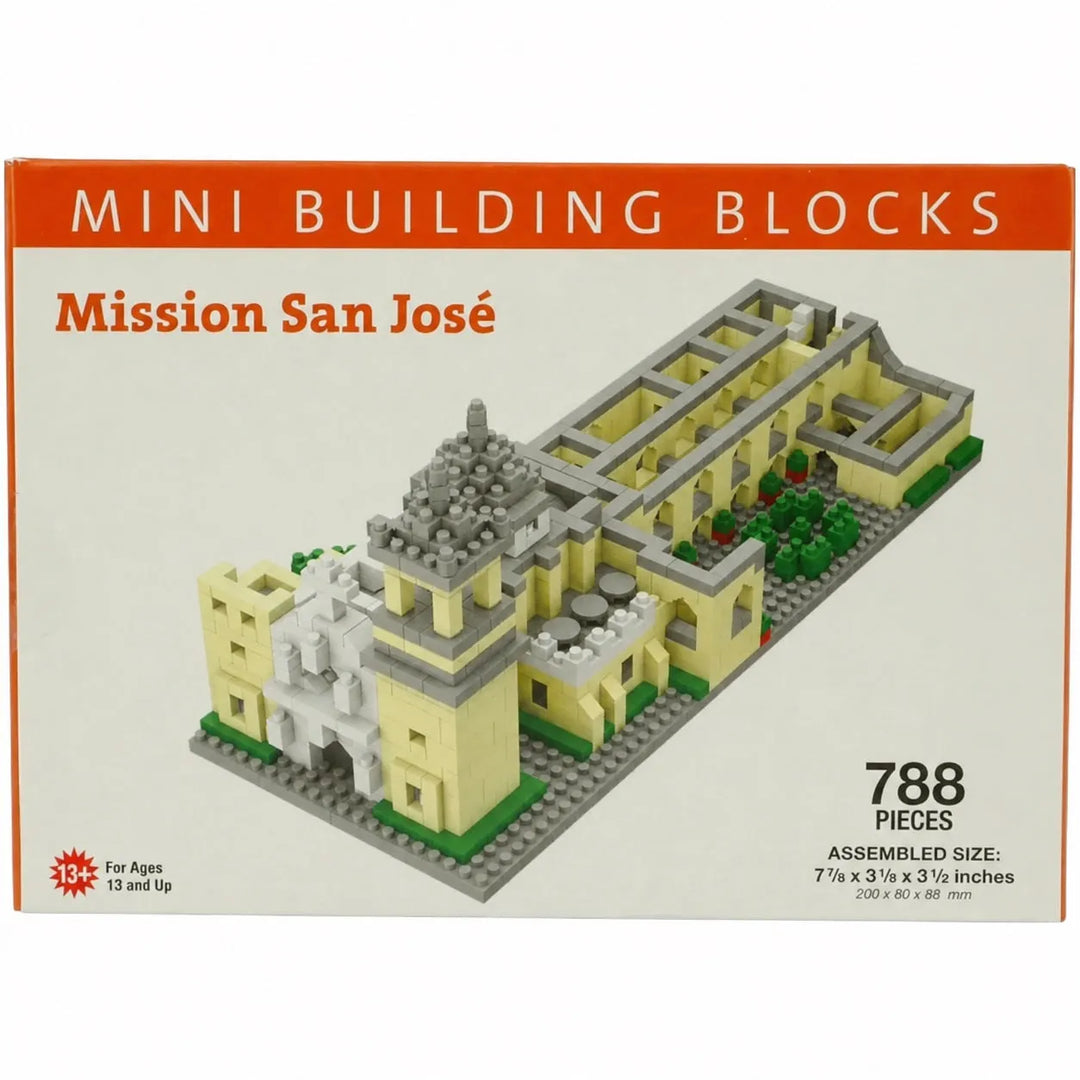 Front of a Mini Building Blocks box for Mission San José, showing the assembled brick-built model on the front. The packaging has an orange header and white background with product details including 788 pieces and assembled size.