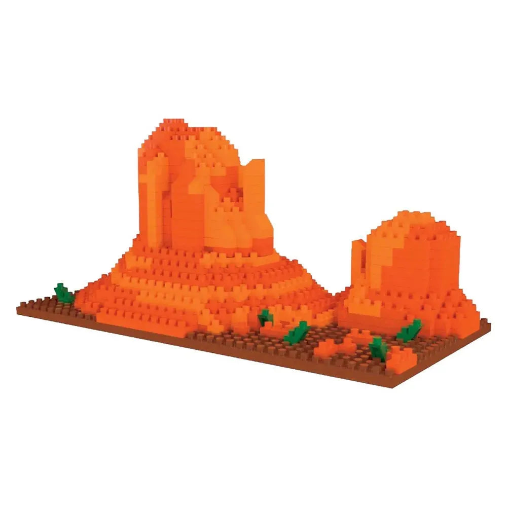 Mini building blocks shaped like Monument Valley against a white background.
