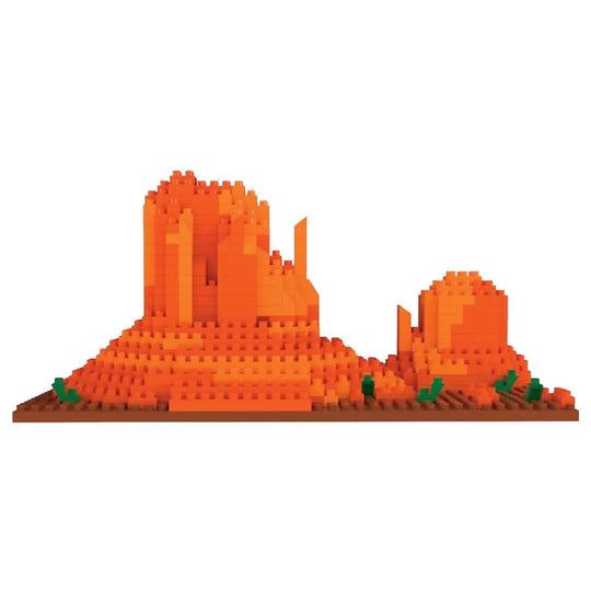 Mini building blocks shaped like Monument Valley against a white background.