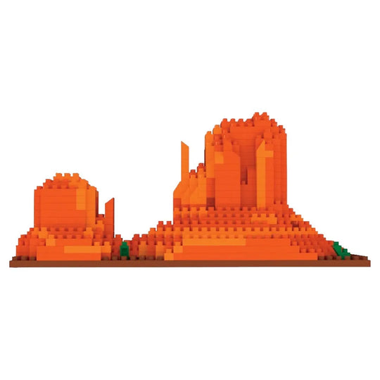 Mini building blocks shaped like Monument Valley against a white background.