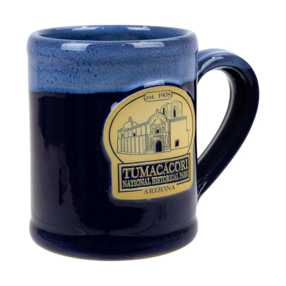 Blue mug with Tumacócori National Historical Park logo on a white background
