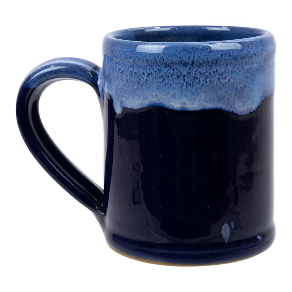 Blue ceramic mug with a gradient finish on a white background