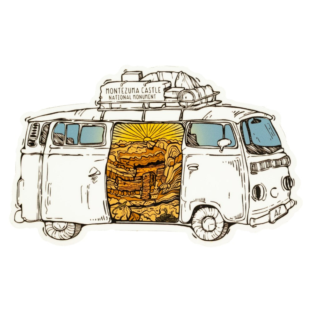 Sticker featuring an illustration of a vintage van with a door open, showing a an ancient dwelling carved into a mountain and the text Montezuma Castle National Monument, on a white background.