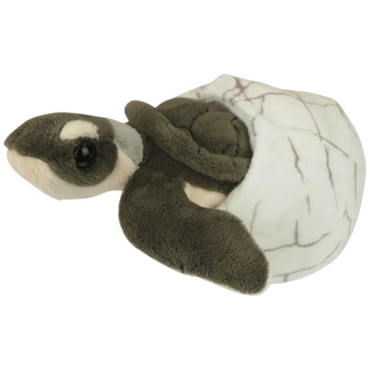 A plush sea turtle toy with a dark brown body and arm, a white face patch, and a white shell with brown cracks, shown on a plain white background.