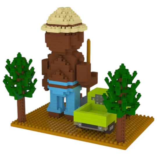 LEGO-like building set with a character, truck, and trees on a white background
