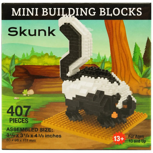 Box front for a mini building blocks set featuring a skunk model. The packaging shows the assembled black-and-white skunk on a tan base, with a painted forest scene in the background and text reading &