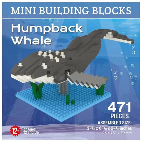 Mini building blocks set of a humpback whale on a blue background with text indicating pieces count and assembly size.