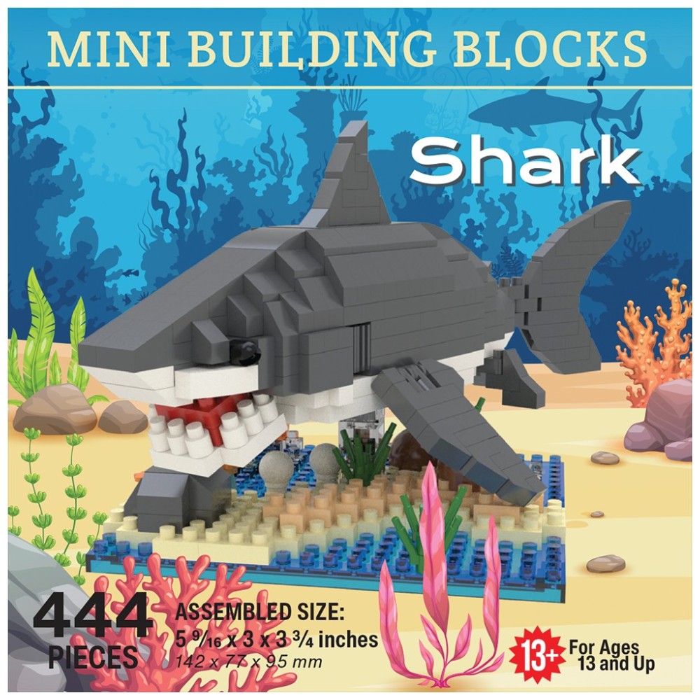 Box-style product graphic for a mini building blocks set shaped like a shark, with the assembled shark model centered over an underwater scene. Text includes &